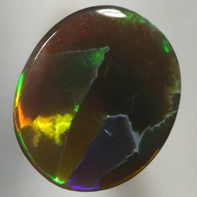 SOLID BLACK OPAL Bright and clean rolling flashes in a Flagstone Harlequin pattern. SEE VIDEO